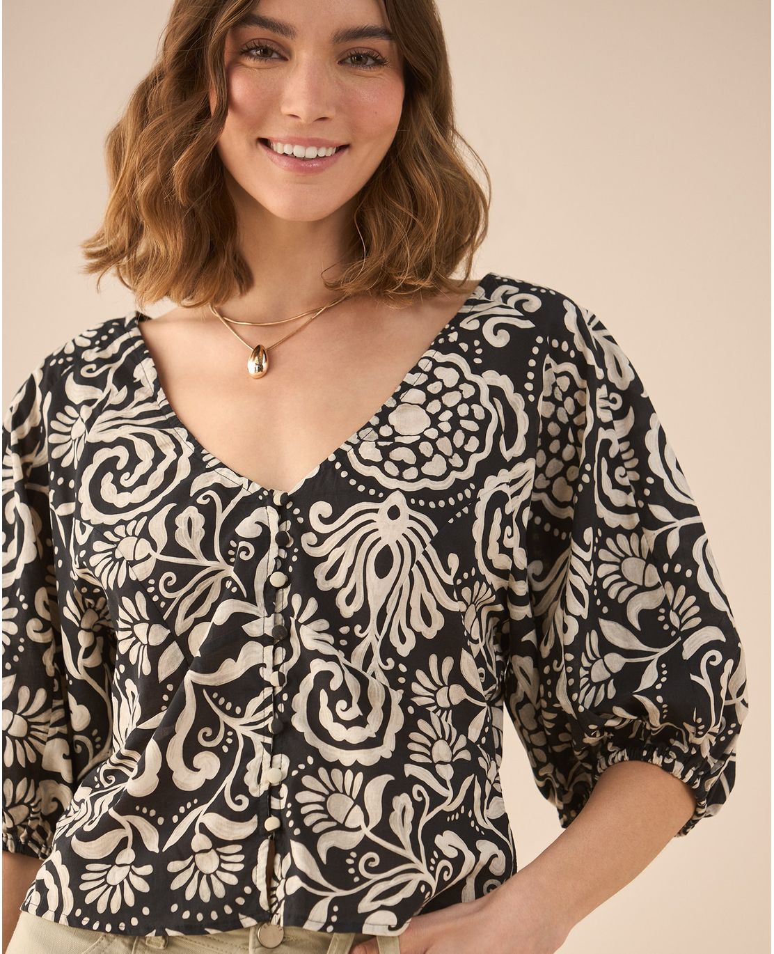 Camisa de escote en V para mujer