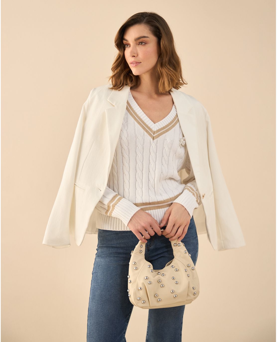 Buzo tejido con escote en V para mujer